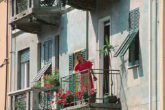 Lady On Balcony